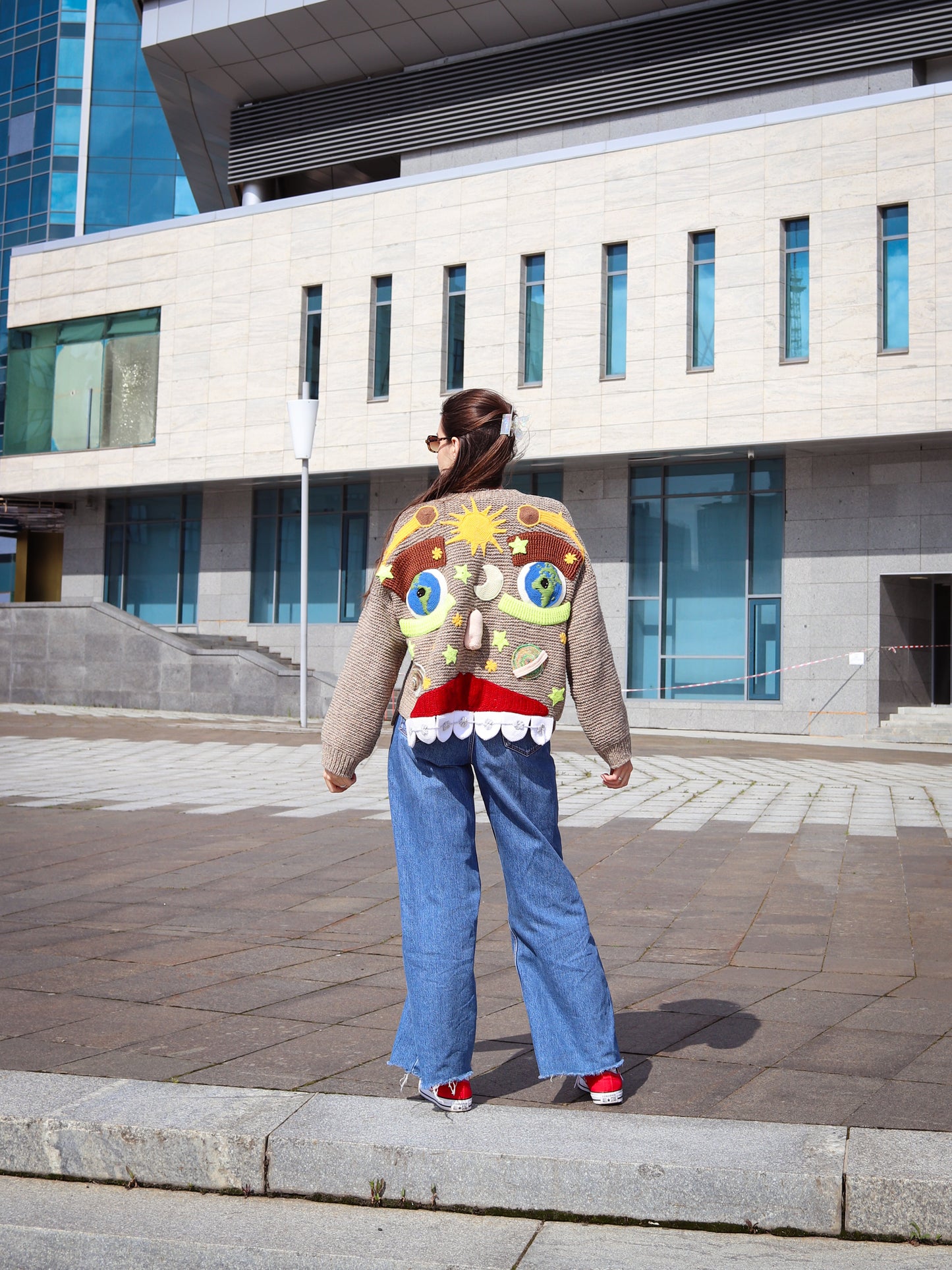 Colorful fairytale cardigan worn as a statement fashion piece