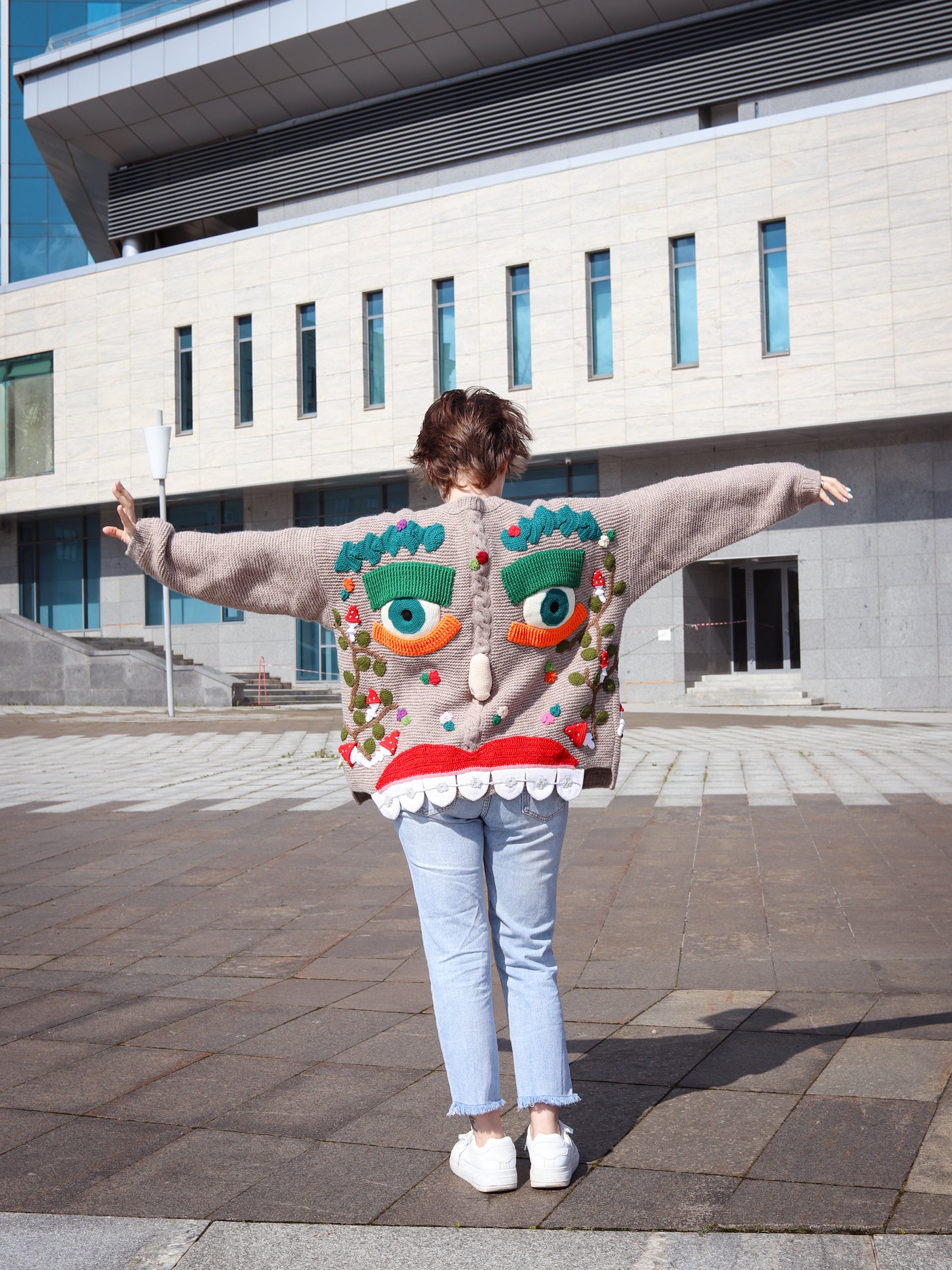 Fairytale-inspired wearable art cardigan with embroidered details
