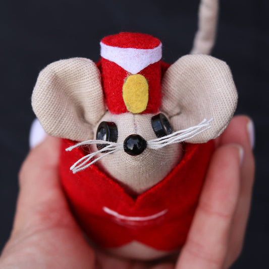 Coraline-inspired jumping mouse toy with circus outfit