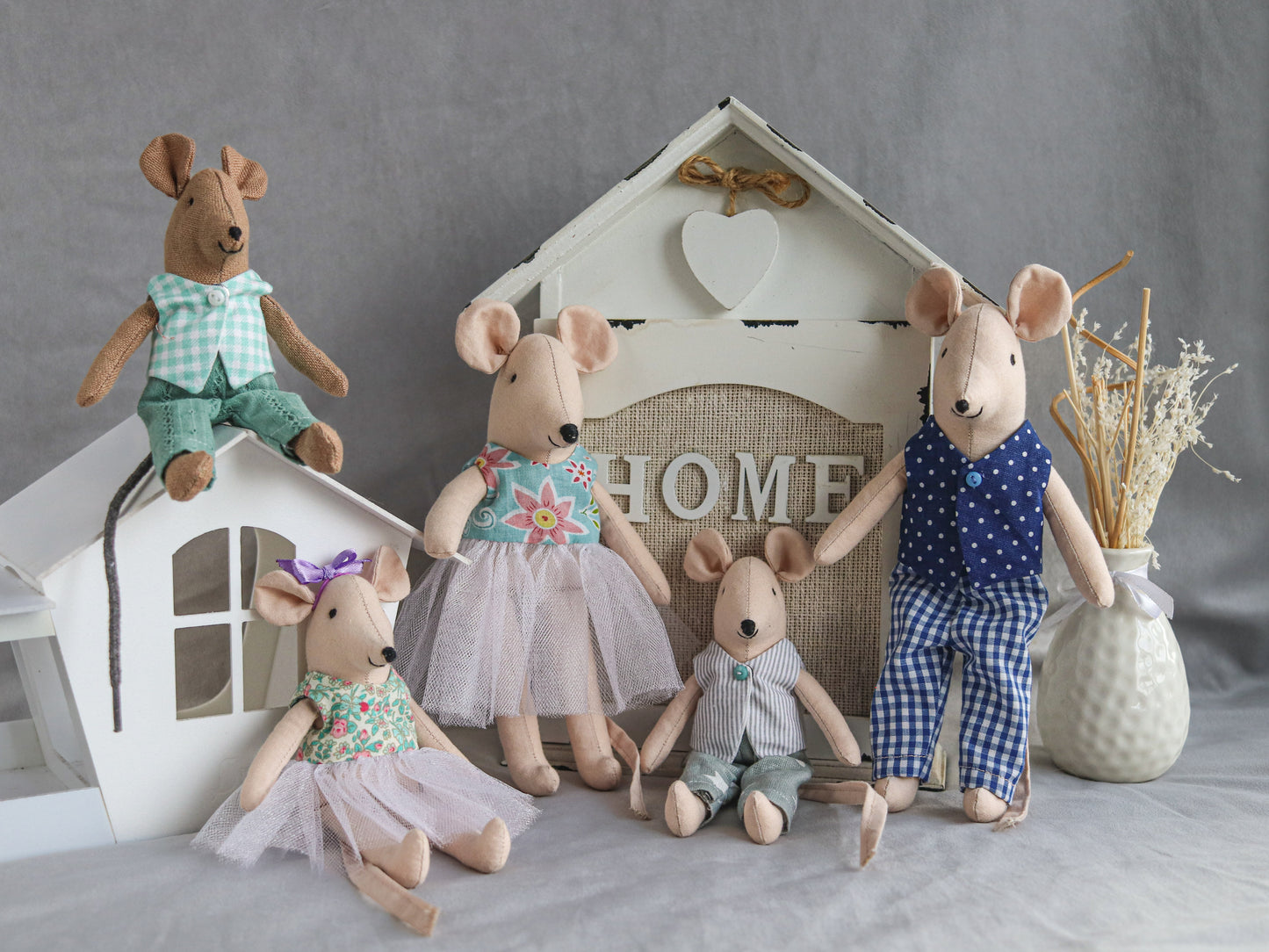 Close-up of miniature Maileg-size mice with soft clothes